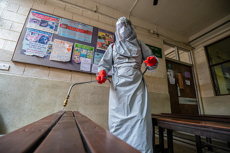 A Patan Hospital staff wearing a protective gear sprays disinfectant at the Hospital premise during the third day of the nationwide lock down amid concerns about the spread of corona virus (COVID-19).
World Health Organisation (WHO) announced 18,589 Confirmed deaths Worldwide by the corona virus (COVID-19) disease.