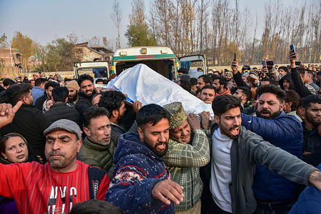 (EDITORS NOTE: Image depicts death)
Kashmiri mourners carry the dead body of Muhammad Shafi, a civilian killed in an explosion inside a police station, during his funeral procession in Srinagar. Nine persons were killed and 32 others were injured in a major explosion inside a Police Station. Explosives reportedly detonated during a forensic investigation as part of a probe into an earlier blast in India’s capital, New Delhi, that killed 13 people and injured dozens.