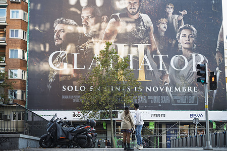 A large advertisement billboard promoting the movie Gladiator II (Gladiator 2), produced by Red Wagon Entertainment, distributed by Paramount Pictures, and directed by Ridley Scott, is seen in Spain.