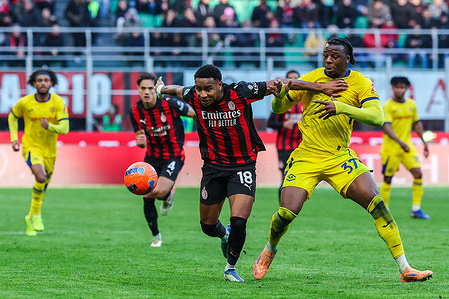 Christopher Alan Nkunku of AC Milan and Armel Bella-Kotchap of Hellas Verona FC seen in action during Serie A 2025/26 football match between AC Milan and Hellas Verona FC at San Siro Stadium. Final score AC Milan :3 | 0 Hellas Verona.