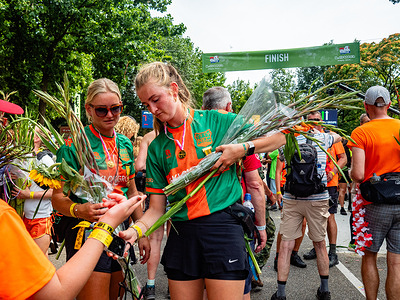 Participants take photos at the finish line during the International Four Days Marches. The International Four Days Marches concluded on the last day with a record 42,777 finishers celebrating on the Wedren, the finish line in Nijmegen. More than 45,000 walkers from 82 countries started Tuesday’s march, covering 30, 40, or 50 kilometers daily. Over the week, 2,762 walkers dropped out, including 411 on the final day.