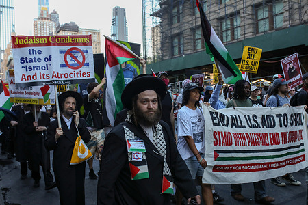 A group of anti Zionism Jews from Neturei Karta hold placards during a rally for Palestine. A few hundred pro-Palestine demonstrators gathered on August 12, 2025, in front of the New York Times headquarters in New York City to denounce the mainstream media’s complicity in the genocide in Palestine.
