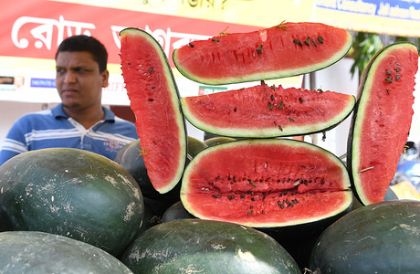 Sliced watermelons seen displayed by a vendor. People eat lots of watermelons during the summer to cool them selves down, in Agartala, capital of the Northeastern state of Tripura, India.