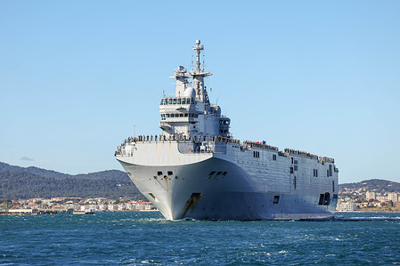 The amphibious helicopter carrier Dixmude departs the French naval port of Toulon. The amphibious helicopter carrier "Dixmude", escorted by the stealth frigate "Aconit", departed the French naval port of Toulon for a mission in the Mediterranean Sea.