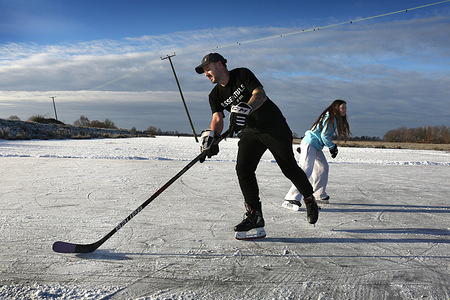 Skaters from all over East Anglia play ice hockey on snow-cleared natural ice during the cold snap. Fen-skaters seen playing ice hockey, on the frozen flooded fields while they last. The beauty of natural skating is that it's very safe with ice on the flooded fields.And if the winter is cold enough, a skating championship will be held in the natural fields. (last held since 2009).