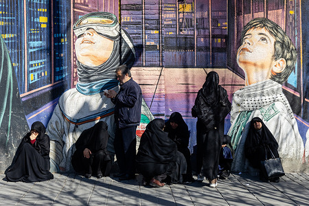 Supporters of the Islamic Republic of Iran gather in the streets to mourn after reports of the killing of Ali Khamenei during the Iran–Israel war, holding a mourning ceremony earlier today in Tehran, Iran.