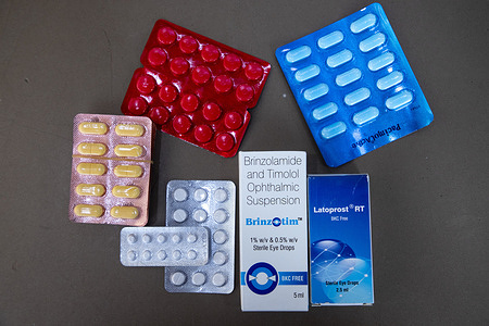 Different kinds of medicines are seen at a chemist shop in Srinagar.