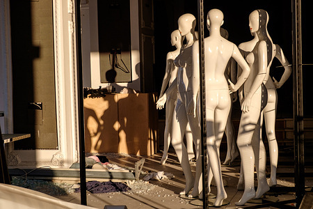 Mannequins are seen at a large fashion store in the city of Rehovot in central Israel. The ballistic missile attacks launched from Iran on cities in central Israel caused extensive economic damage even in areas far from the impact zone. Many shopping centers and stores were damaged and their operations were suspended for an unknown period of time.