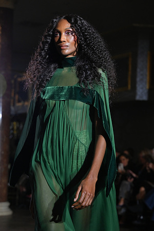 A model walks in a Victorio and Lucchino design at the International Flamenco Fashion Week Madrid, (SIMOF) show, at the Wellington Hotel.