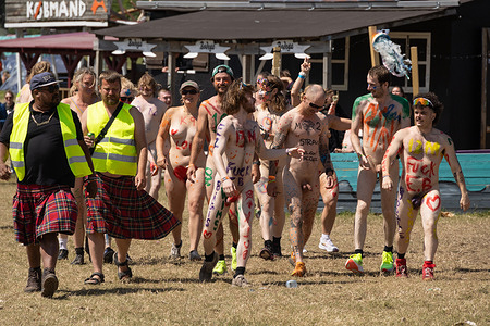 (EDITOR'S NOTE: Image contains nudity) 
Participants take part during the annual nude race at Roskilde Festival 2025 in the Camping Area Dream City. Only the first 30 men and women are allowed to rush into battle for two tickets to the next year's Roskilde Festival. The festival is the largest of its kind in the Nordics, with an expected 130,000 participants creating Denmark’s fourth largest “city” during the 7 days of the festival spans.
