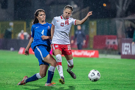 Nigar Mirzaliyeva of Azerbaijan and Dominika Grabowska of Poland are seen in action during the UEFA Women's EURO 2021 qualifying match between Poland and Azerbaijan at Polonia Stadium. 
(Final score; Poland 3:0 Azerbaijan)