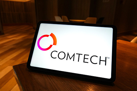 In this photo illustration, the Comtech logo is seen displayed on the screen of a smart tablet.