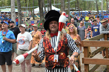 A man juggles pins at the seventh annual Suwannee Roots Revival music festival, at the Spirit of the Suwannee Music Park in Live Oak.
