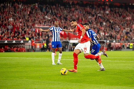 (L-R) Vangelis Pavlidis of Benfica and Alan Varela of Porto, seen in action during the 11th round of the Liga Portugal Betclic, between Benfica and Porto. Final score; Benfica 4:1 Porto.