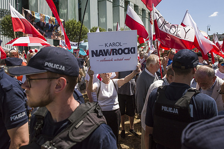 Karol Nawrocki's supporters wave Polish flags, hold crucifixes and chant anti government slogans during a demonstration outside the Supreme Court. Poland's Supreme Court gathered to rule on the validity of last month's presidential election, following numerous appeals over the conduct of a vote won by the nationalist opposition candidate, Karol Nawrocki. Nawrocki took 369,000 more votes than his rival, Warsaw mayor Rafal Trzaskowski, the candidate put forward by the government.
Prosecutors allege the vote count was falsified in Nawrocki's favor at some polling stations, fuelling calls for a national recount. The Supreme Court has received around 56,000 election protests since the second round of voting.
Meanwhile two protests are taking place at the building of the Supreme Court. One is led by Marta Lempart, leader of the Women's Strike movement, demanding a recount of the votes in all election commissions. The other protest is organized by Nawrocki's supporters, who are demanding that the court immediately recognize Nawrocki's victory.