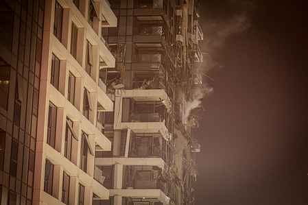 Smoke rises from a building that was damaged in an Iranian ballistic missile strike in Tel Aviv. Israel launched a sweeping assault on the heart of Iran’s nuclear and military infrastructure on Friday, deploying warplanes and drones previously smuggled into the country to strike key facilities and kill top generals and scientists—a barrage it said was necessary to prevent Iran from advancing closer to building an atomic weapon. Iran retaliated late Friday by unleashing scores of ballistic missiles on Israel, where explosions lit up the skies over Jerusalem and Tel Aviv and shook the buildings below.