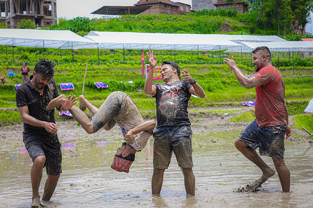 People enjoy as they take part in annual Paddy Day celebration in Bhaktapur.
Nepal annually has been celebrating the15 Ashar (29 June) as the National Paddy since 18 years which is also known as the festival that links people with the soil.