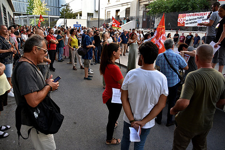 Participants listen to one of their own giving a speech during the CGT (Confédération Générale du Travail) union meeting. The CGT (Confédération Générale du Travail) Departmental Union of Bouches-du-Rhône organized a big meeting to prepare for demonstrations against government measures which they say are impoverishing the majority of French people.