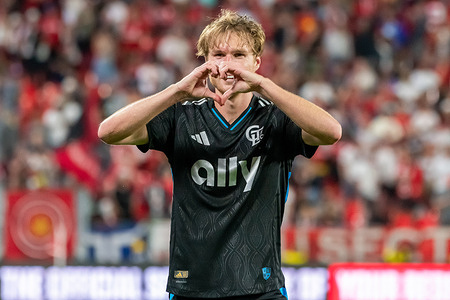 Henry Kessler #22 of Charlotte FC celebrates scoring a goal during the MLS game between Toronto FC and Charlotte FC at BMO field. The game ended 3-3.