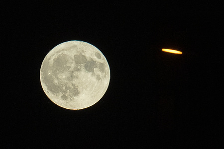 Super moon seen through street lights in Istanbul.