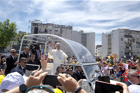 Pope Leo XIV leaves at the end of the meeting with the mayors and faithful of the various municipalities of the "Land of Fires" in Calipari square, during his pastoral visit to Acerra.