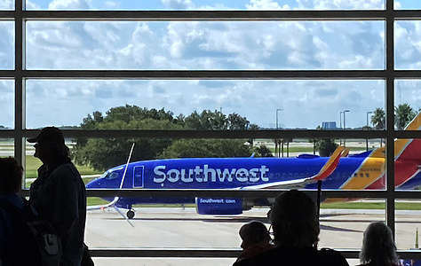 A Southwest Airlines plane taxis on the tarmac in preparation for takeoff at Orlando International Airport. Southwest Airlines said on Thursday it was better-prepared to handle upcoming winter weather due to the carrier's "big investments" in improving de-icing capacity and staffing. Southwest canceled thousands of flights in December 2022, the result of a massive winter storm.