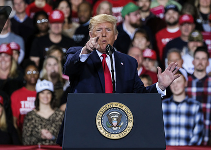 President Donald Trump speaks during the "Merry Christmas" rally at the Kellog Arena in Battle Creek, Michigan.