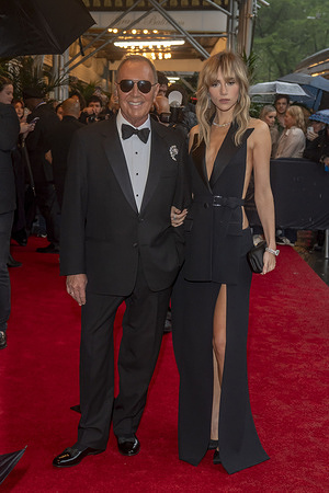 New York, United States - 05/05/2025 17:01:32: (L-R) Michael Kors and Suki Waterhouse wearing Michael Kors depart the Pierre Hotel for 2025 Met Gala in New York City.