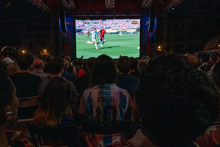 People watch a live broadcast of the FIFA World Cup final between Spain and Argentina at Gostiny Dvor.