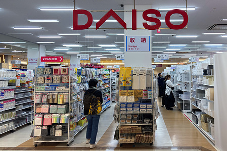 A woman shops at a Daiso 100-yen shop in Shinjuku, as the Japanese discount retailer continues to expand its global presence amid strong popularity overseas. Known for its wide range of affordable household goods, Daiso offers products including kitchenware, tableware, stationery, cosmetics, cleaning supplies, storage items, gardening tools, snacks, and seasonal goods, attracting customers with its variety and low prices. The company operates thousands of stores worldwide across Asia, North America, Europe and the Middle East, making it one of Japan’s most recognizable retail brands abroad.