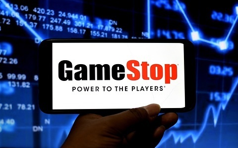 In this photo illustration a GameStop logo seen displayed on a smartphone.