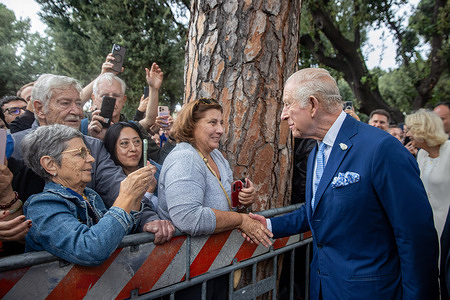 King Charles III (R) greets faithful as he leaves St. Paul Basilica Outside The Walls in Rome at the end of an ecumenical Service. An ecumenical joint prayer service in the Vatican’s Sistine Chapel made history as King Charles III and Pope Leo XIV prayed together publicly for the first time since the Reformation nearly 500 years ago. Joined by Queen Camilla and the Archbishop of York, the event symbolized renewed unity between the Catholic and Anglican Churches. Centered on the theme of “care for creation,” it reflected their shared commitment to environmental stewardship during the Catholic Church’s 2025 Jubilee Year.