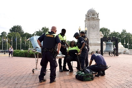 Members of the DC Fire Department tend to a security guard who was pepper sprayed in front of Union Station in Washington. President Donald Trump has deployed the National Guard in Washington under the guise of reducing crime, but despite their frequent high-visibility presence at Union Station, they were not present at the time of the attack.