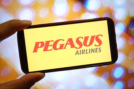 In this photo illustration, a Pegasus Airlines company logo is seen displayed on a smartphone screen.