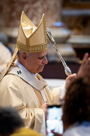 Pope Leo XIV leaves after Sunday Mass where he made ten new priests at St. Peter's Basilica.