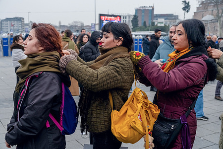 Protesters are braiding their hair during the demonstration. Kurdish political parties and civil society organizations in Istanbul protested the attacks against Syrian Kurds. Some people were affected by tear gas during the police intervention. Women braided their hair to show their support for Kurdish women in Syria. Thousands of civilians have been displaced since clashes began between the Syrian government and the Kurdish organization Syrian Democratic Forces (SDF).