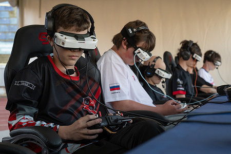 Men take part in the Pobeda Drone Racing Festival at Petrovsky Stadium. The "Pobeda" Drone Racing Festival was held at "Petrovsky" Stadium in St. Petersburg, Russia. The festival was organized by the Russian Drone Racing Federation.
