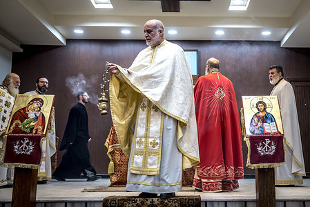 A priest waves incense during a Divine Liturgy service at the Mar Elias Greek Orthodox church. The Mar Elias Greek Orthodox Church in Dweilaa, Damascus, reopened just one week after a deadly suicide bombing on June 22, 2025, that killed at least 22 people and wounded many others. Despite the heavy damage from the blast, the church held its first Mass on June 29, with worshippers gathering amid the shattered glass and charred walls to demonstrate their faith and resilience. Restoration work continues, and to this day, worshippers still attend services, making the church a lasting symbol of perseverance and hope.