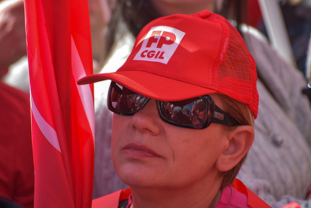 A protester attends the national strike of private healthcare and RSA workers. The mobilization was organized by the FP CGIL, CISL FP and UIL FPL unions to demand the renewal of national collective labor contracts and improved working conditions for private healthcare and nursing home workers.