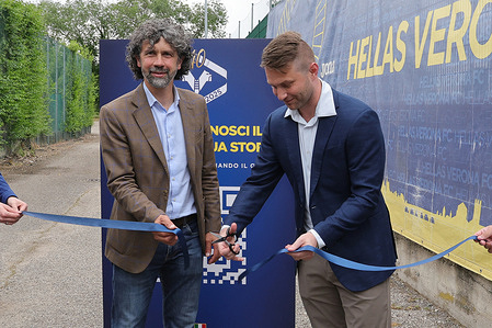 The Mayor of Verona Damiano Tommasi (L) and the Vice-President of Presidio Investors and President of Fondazione Hellas Verona, Dirk Swaneveld open the exhibition during the visit at the VeronaCamp40ne exhibition at Marcantonio Bentegodi stadium.