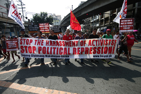 Activists seen holding a huge banner during the protest.
Student groups, activists, and the mothers of those who were killed during the War on Drugs marched to Mendiola in Manila, as they denounced the continuous political repression of the critics of President Duterte and for the end of the killings in the country.