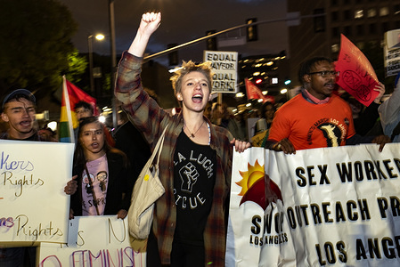 Activists are seen chanting slogans while holding a banner during the International Women's Strike in Los Angeles.
The rally coincided with International Women's Day which was first recognized by the United Nations in 1975.