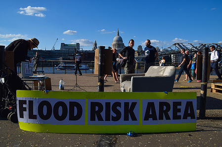 Flood Risk Area placard seen during the G7 protest.
Extinction Rebellion activists gathered outside Tate Modern as part of the wider G7 climate change protests, and to raise awareness of rising sea levels and flooding due to global warming.