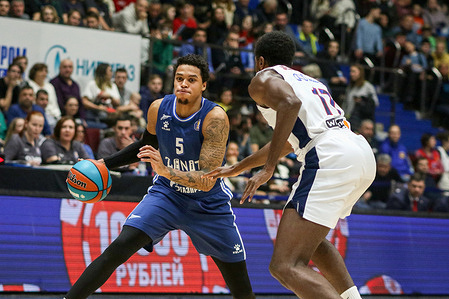 Caleb Homesley (No.5) of Zenit and Livio Jean-Charles (No.17) CSKA seen in action during the VTB United League basketball match between Zenit and CSKA at Sibur Arena. Final score; Zenit 80:85 CSKA.