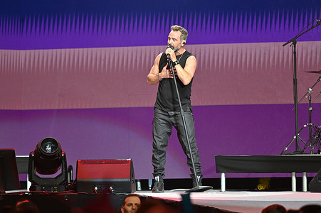 The singer Jordi Sánchez of the group OBK performs during the solidarity concert of Cadena 100 Por ELLAS at the Movistar Arena, in Madrid.