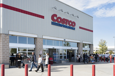 Shoppers are seen at the American multinational retail stores corporation, Costco Wholesale in Madrid.