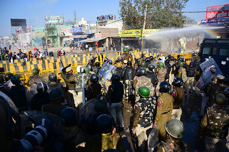 Farmers clash with police officers during the demonstration.
Thousands of farmers from various states march towards the India capital to protest against new agricultural laws they say will severely hurt their incomes, according to farmers union.