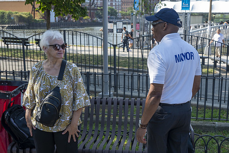Mayor Eric Adams talks with residents at Astoria Houses during announcement event of the expansion of the NYPD's Quality of Life Division "Q-Teams" across the entire borough of Queens at Astoria Houses in the Queens borough.