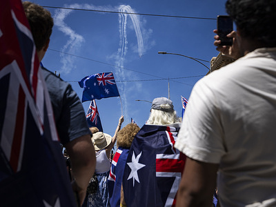 A flyover from the RAAF Roulettes seen over the march. March for Australia rally at Parliament House in Melbourne.
Despite the formal disbanding of the National Socialist Network, individuals displaying neo-Nazi symbols including the Sonnenrad (Black Sun) were observed. During speeches, two influencers were verbally harassed and called racial slurs by members of the crowd before being escorted away by police, after which sections of the crowd chanted anti-immigration slogans.
