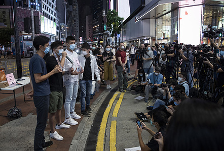 Pro-democracy activist Joshua Wong and other activists holding 'Bring Them Back' transparent cards, speaking to media during the rally.
Pro democracy activists rally in Hong Kong in support of the 12 Hongkongers detained in Mainland China after allegedly trying to flee to Taiwan to claim political asylum in August 2020. The 12 detainees has committed different political crimes in Hong Kong and were on court bail when they fled.